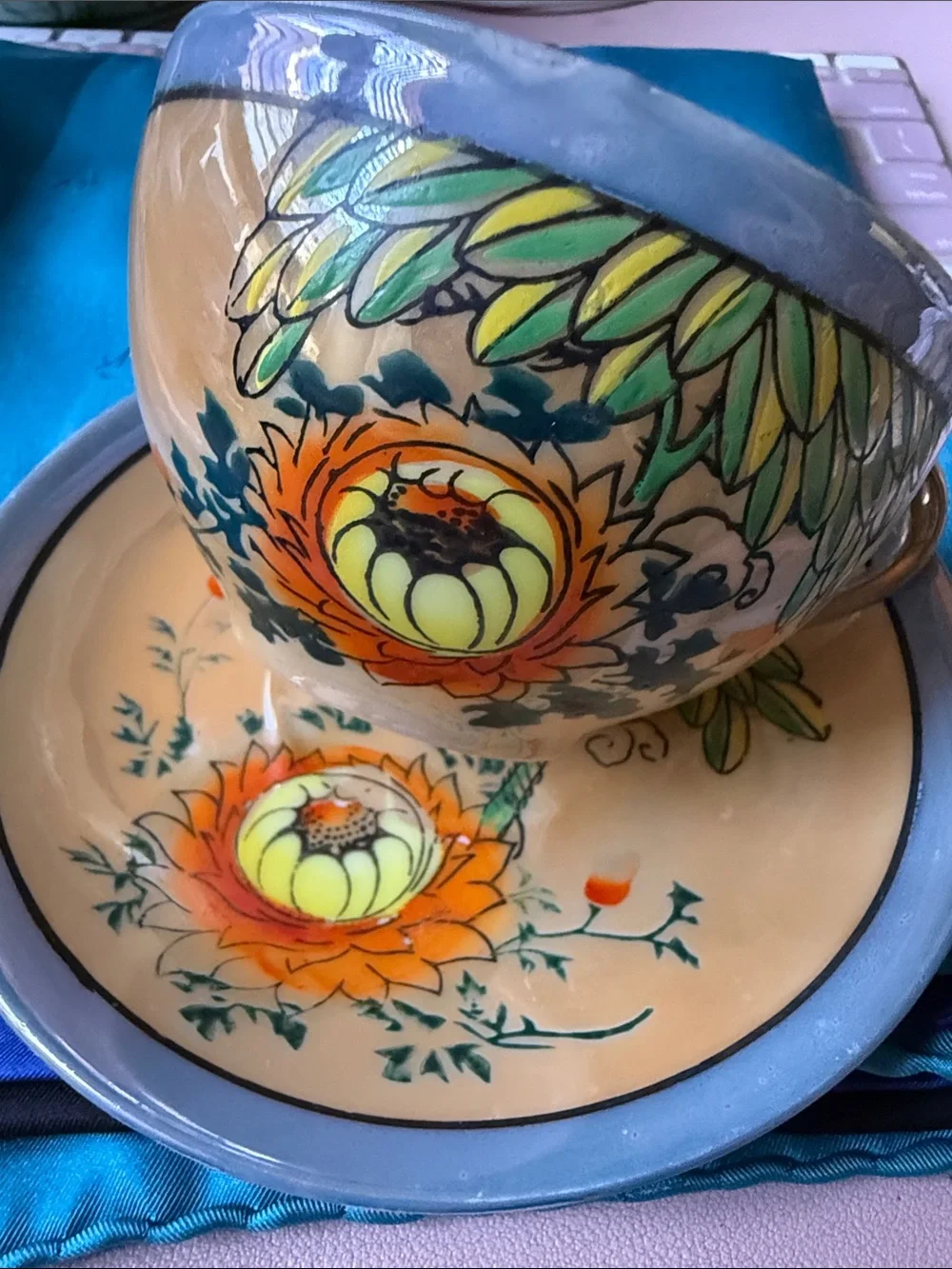Vintage ca 1940-50’s  made in Japan orange flower lusterware tea cup & saucer